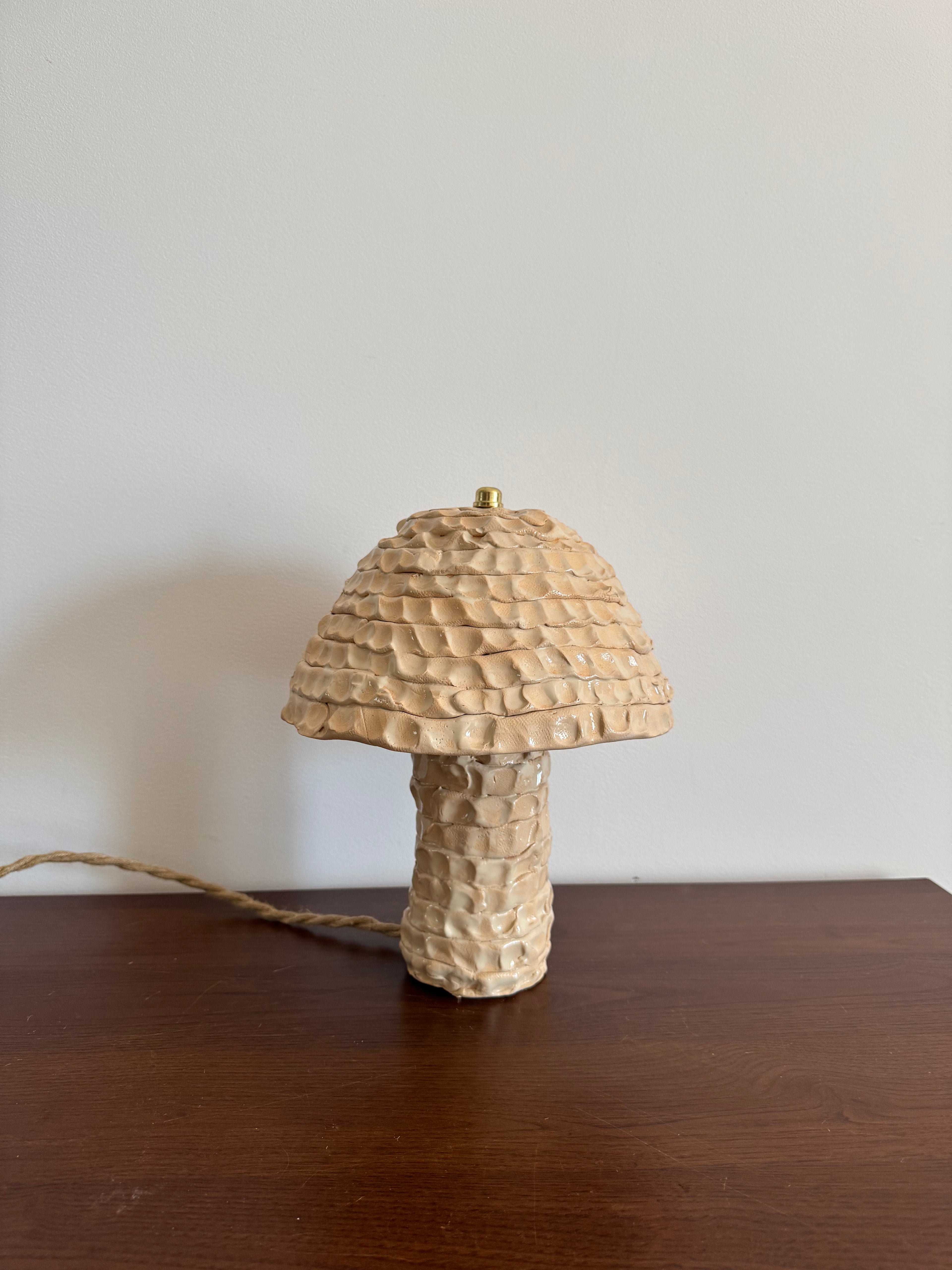 Ceramic lamp in warm beige color