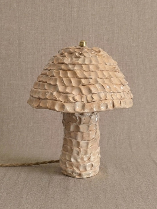 Ceramic lamp in warm beige color